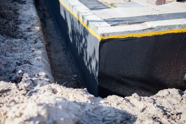 Professional Waterproofing technician working in Temperance, MI